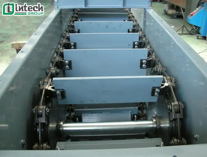 Băng tải xích cào: Cấu tạo, Cách hoạt động và Ứng dụng công nghiệp